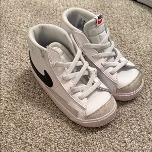 Nike Kids White Sneakers with Black Swoosh